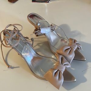 Tan and clear heels with straps and pretty bow
